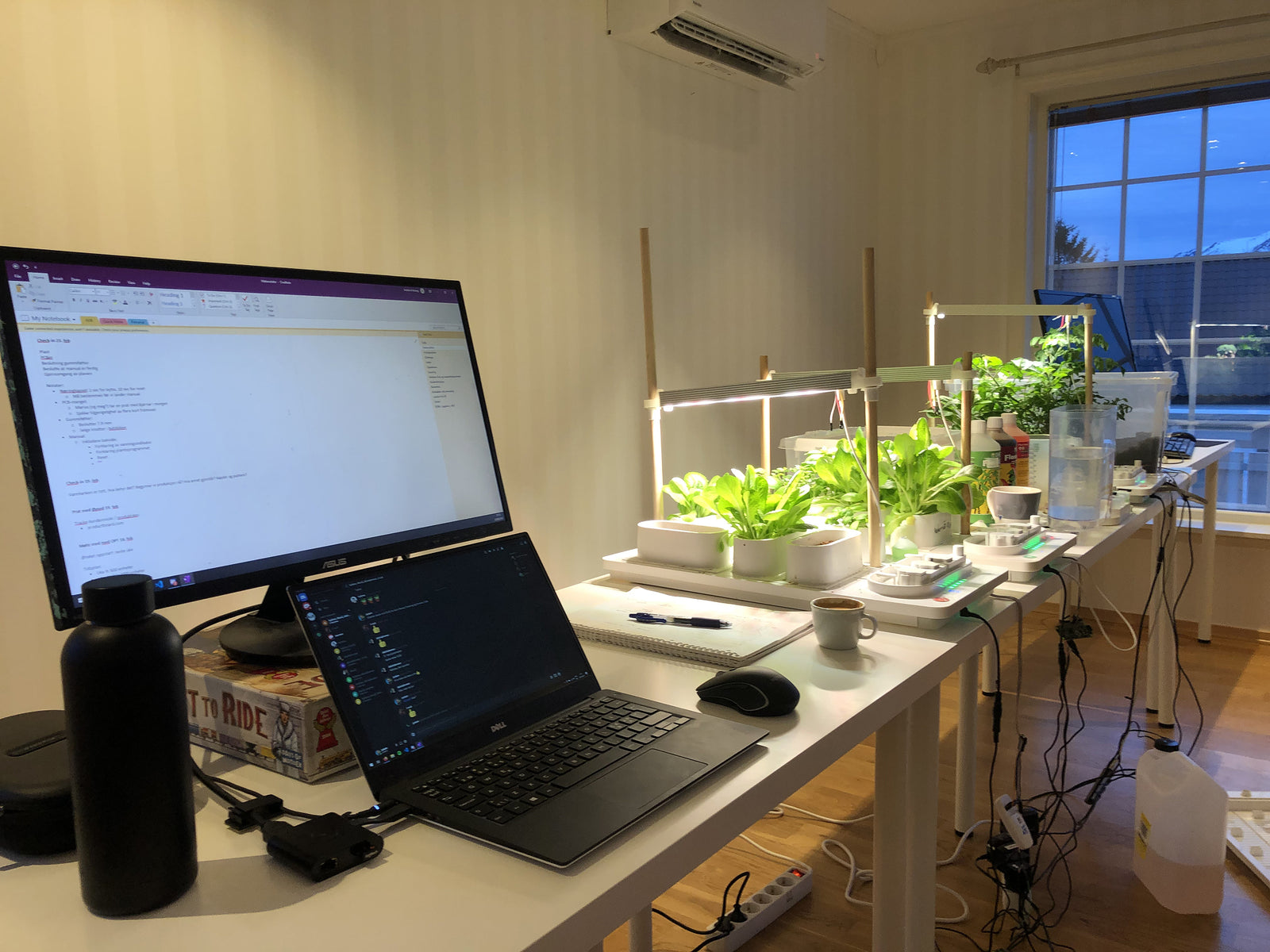 Photo · the team at work — late nights, whiteboards, prototypes everywhere